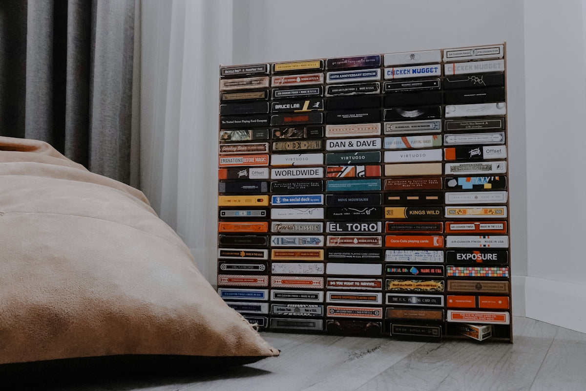 books on black wooden shelf