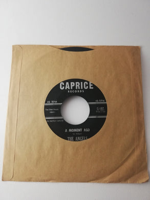 45 giri -  The Angels  'Til / A Moment Ago