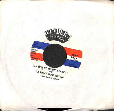 45 giri 7 '' - la tipica Dominicana la que no muerde patea